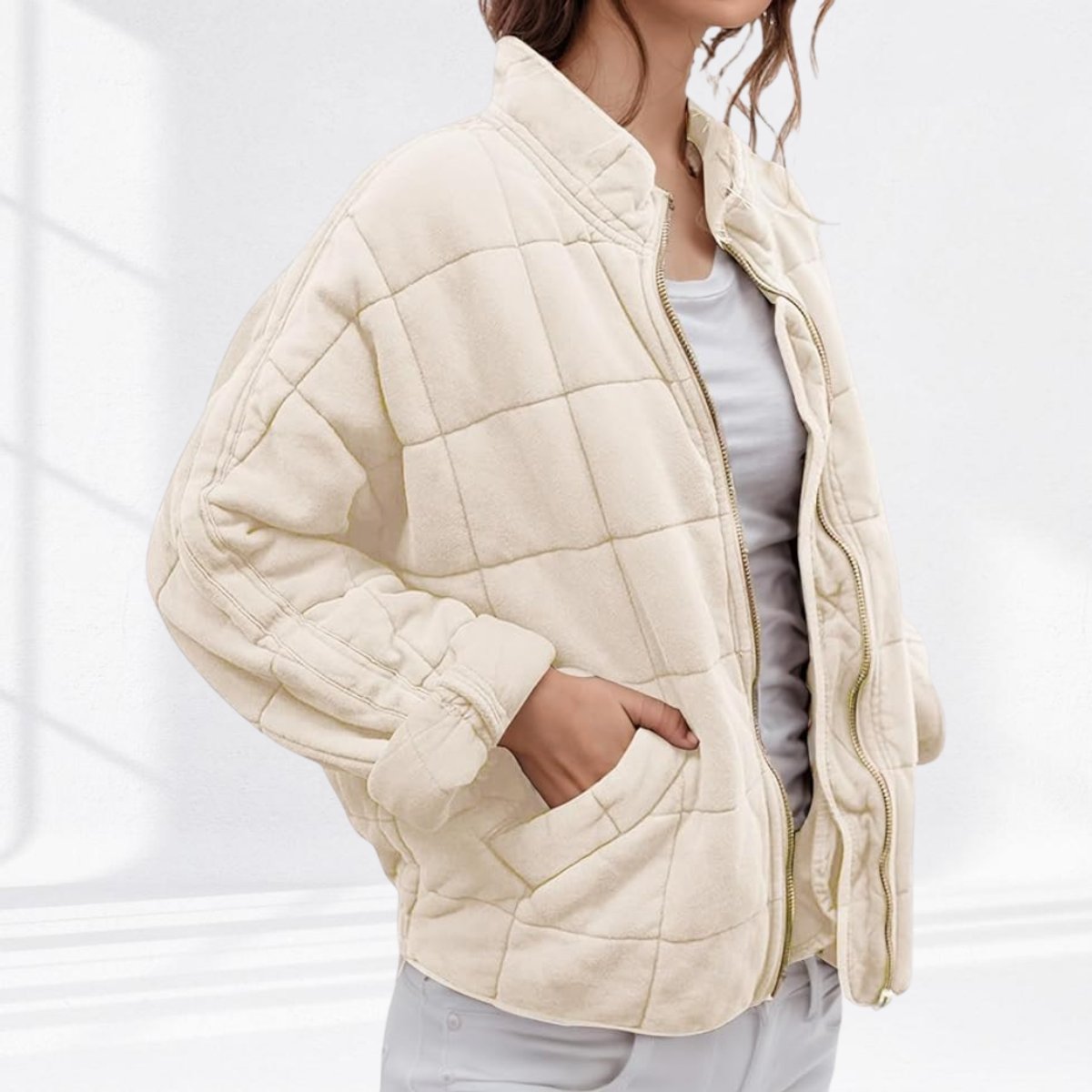 Women's relaxed-fit diamond quilted zip-up jacket by Christine Brewer, casual style with a cozy, textured design.