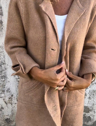 Christine Brewer women's relaxed-fit long button-front lapel coat, casual style, shown in a natural pose.