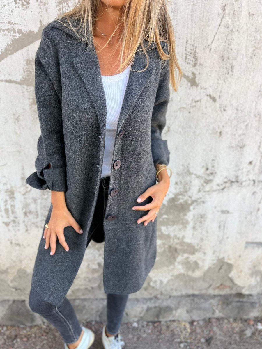 Christine Brewer women's relaxed-fit long button-front lapel coat, casual style, shown in a natural pose.