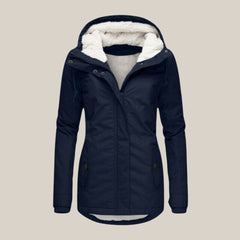 Women’s Sherpa-lined quilted winter jacket with hood by Christine Brewer, featuring cozy fleece lining and quilted design.