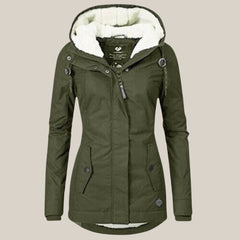 Women’s Sherpa-lined quilted winter jacket with hood by Christine Brewer, featuring cozy fleece lining and quilted design.