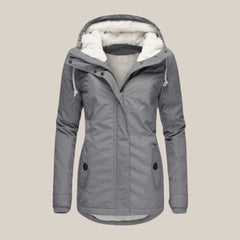Women’s sherpa-lined quilted winter jacket with hood, Christine Brewer fleece coat featuring cozy sherpa lining and quilted design.