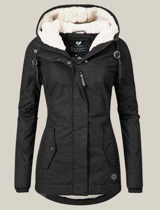 Women's Sherpa-lined quilted winter jacket with hood by Christine Brewer, featuring cozy fleece lining and quilted design.