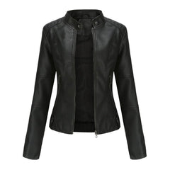 Women's short-cut faux leather moto jacket with zip-up mock-neck design by Christine Brewer, stylish and edgy outerwear.