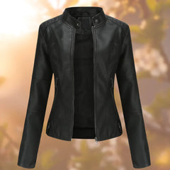 Women's slim-fit zip-up moto faux leather jacket by Christine Brewer, featuring a stylish design and classic motorcycle-inspired silhouette.