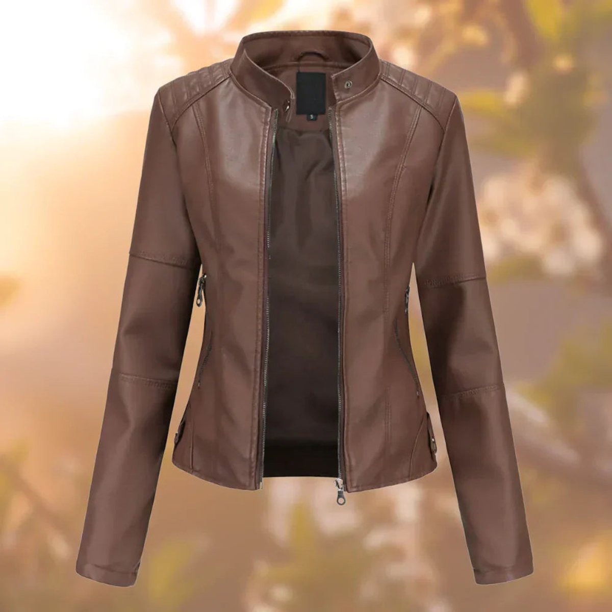 Women’s slim-fit zip-up moto jacket in faux leather by Christine Brewer, showcasing a stylish, fitted design with a front zipper.
