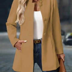 Women's longline blazer coat with stand collar and button front by Christine Brewer, shown in a stylish, tailored design.