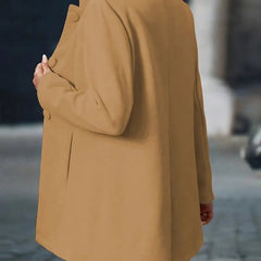 Women's longline blazer coat with stand-collar and button-front closure, stylish outerwear by Christine Brewer.