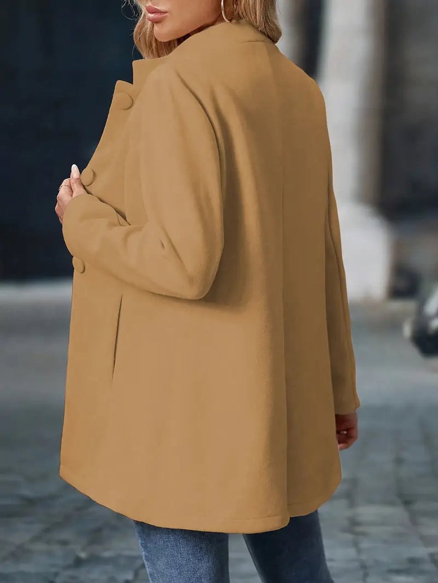 Women's longline blazer coat with stand-collar and button-front closure, stylish outerwear by Christine Brewer.