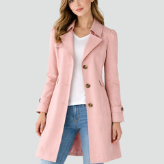 Women's Christine Brewer Layla tailored mid-length double-breasted trench coat hanging on a hanger, showing classic style and beige fabric.