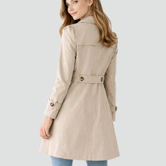 Women's tailored mid-length double-breasted trench coat by Christine Brewer, stylish and sophisticated outerwear for women.