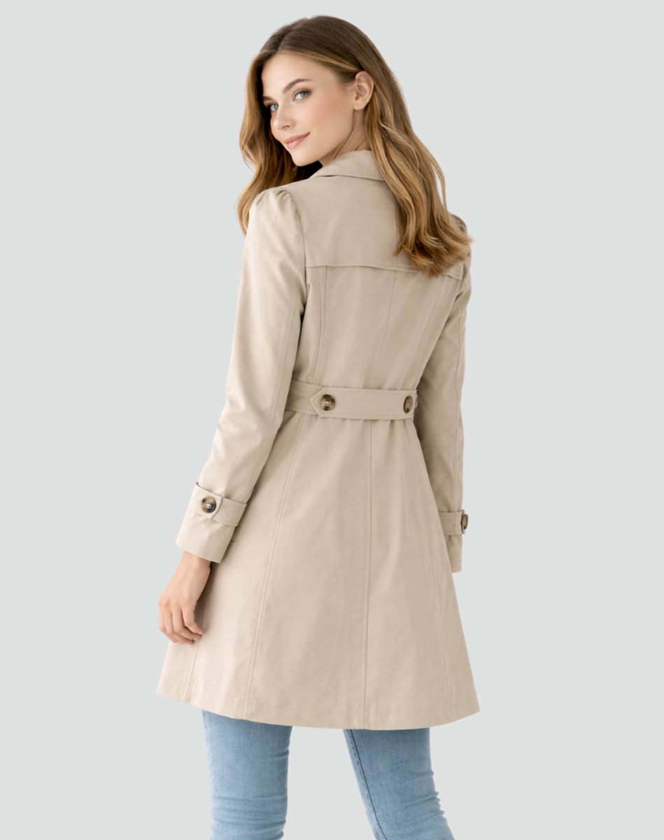 Women's tailored mid-length double-breasted trench coat by Christine Brewer, stylish and sophisticated outerwear for women.