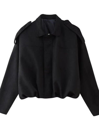 Women's vintage-inspired faux suede oversized bomber jacket by Christine Brewer, showcasing the stylish design and soft texture.