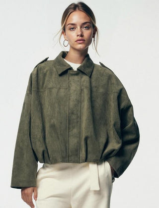 Women's vintage-inspired faux suede oversized bomber jacket by Christine Brewer, shown in a stylish, relaxed fit design.