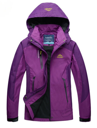 Women's waterproof hooded outdoor shell jacket by Christine Brewer, lightweight and protective for all weather conditions.