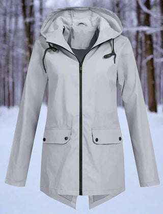Women’s waterproof hooded rain jacket by Christine Brewer with zip-up front, adjustable cuffs, and side pockets.