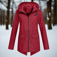 Christine Brewer women's waterproof hooded rain jacket with zip-up front, adjustable cuffs, and pockets, ideal for wet weather.