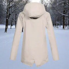 Women's waterproof hooded rain jacket by Christine Brewer with zip-up front, adjustable cuffs, and multiple pockets.