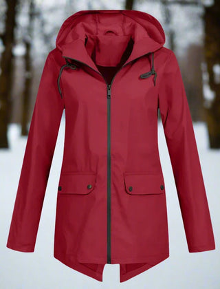Women's waterproof hooded rain jacket by Christine Brewer, longline zip-up design with a hood, ideal for wet weather.
