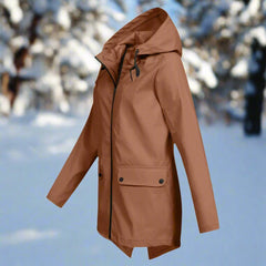 Women’s waterproof hooded rain jacket by Christine Brewer with a zip-up longline design, ideal for wet weather.