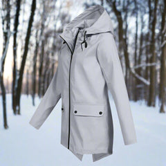 Women’s waterproof hooded rain jacket by Christine Brewer with a zip-up front and longline design, suitable for wet weather.