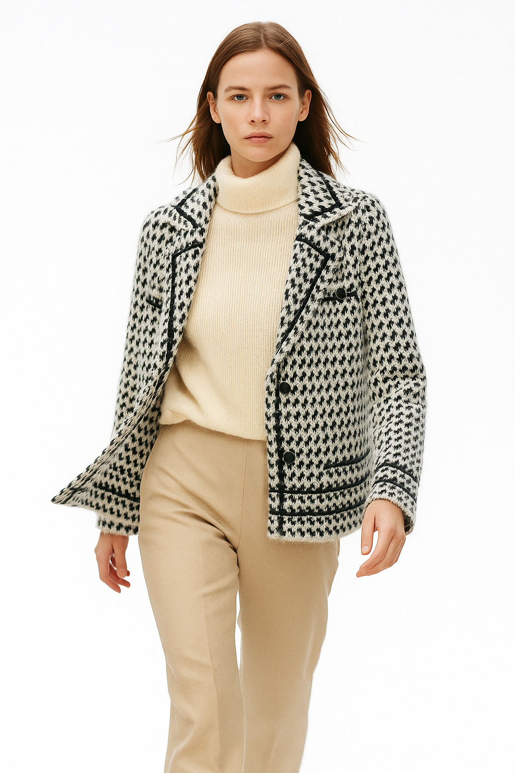 Close-up of Christine Brewer Isabella women's cropped double-breasted knit cardigan in soft wool, showing textured fabric and button details.
