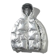 Silver metallic puffer jacket for women by Christine Brewer, featuring a hood and windproof design.