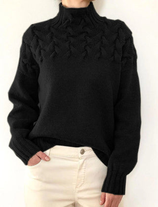 Black women's Tessa turtleneck sweater by Christine Brewer, cozy knitwear with a fitted design and ribbed collar.